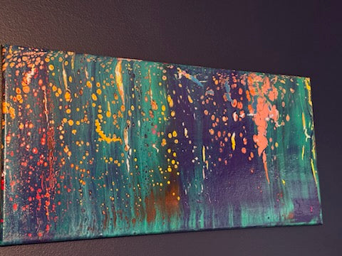 angle → Angled view of Coral Reef Glow showing gallery-wrapped canvas edges
